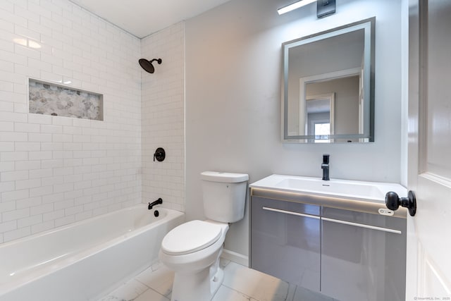 full bathroom with tiled shower / bath combo, vanity, and toilet