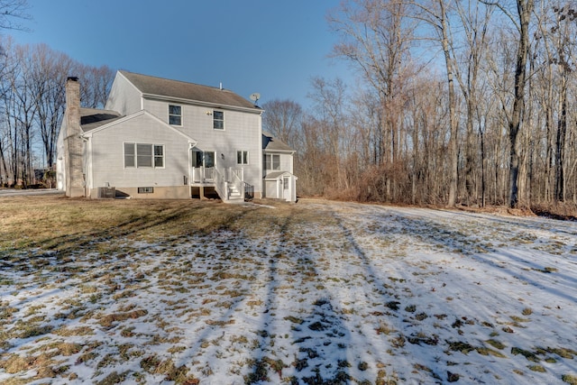 view of snow covered property