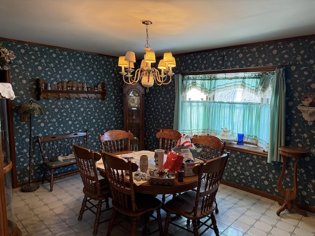 dining area with wallpapered walls, baseboards, tile patterned floors, crown molding, and a notable chandelier