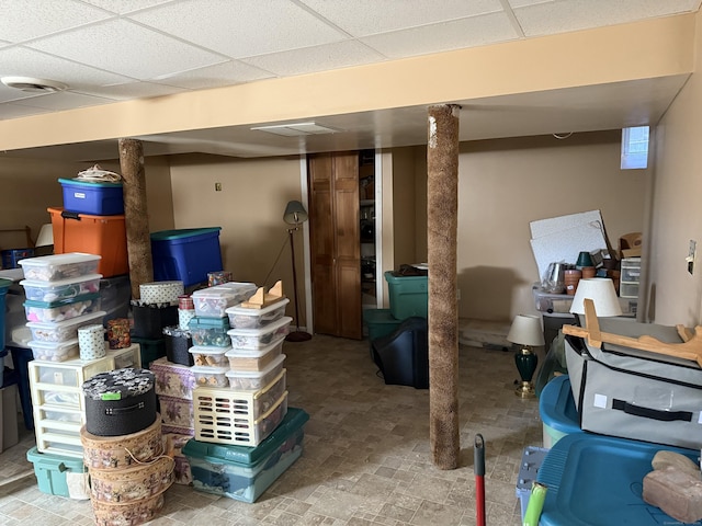 finished basement with a drop ceiling