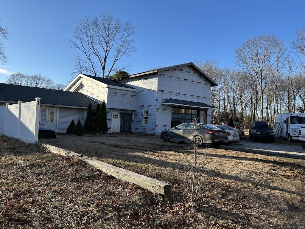 view of property exterior featuring driveway