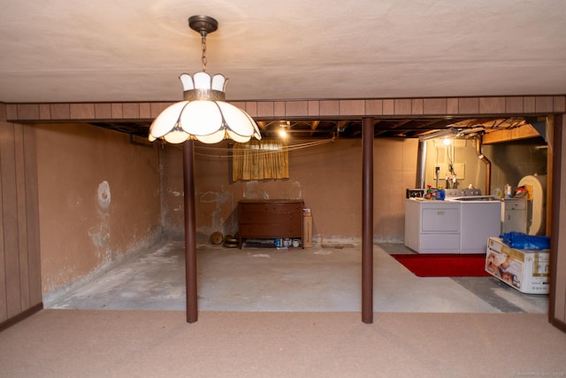 unfinished basement with separate washer and dryer