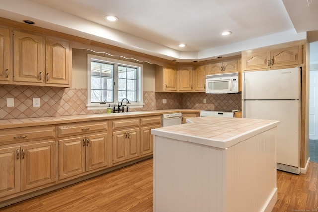 16 Saddle Ridge Rd, New Milford, CT 06776 - kitchen featuring a sink, tasteful backsplash, light wood-type flooring, white appliances, and tile countertops