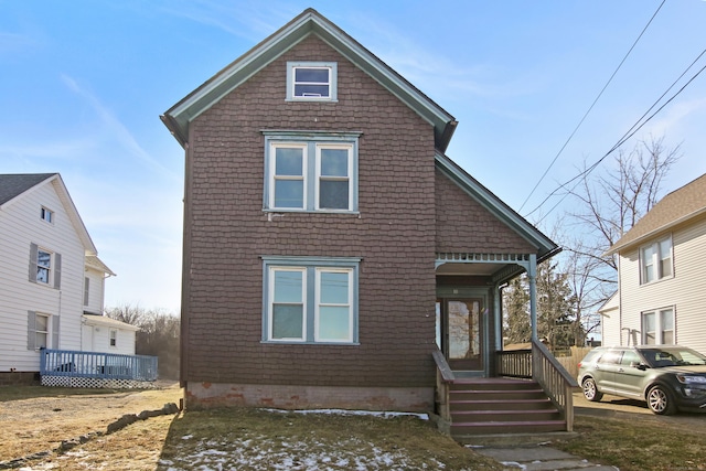 view of property with a porch