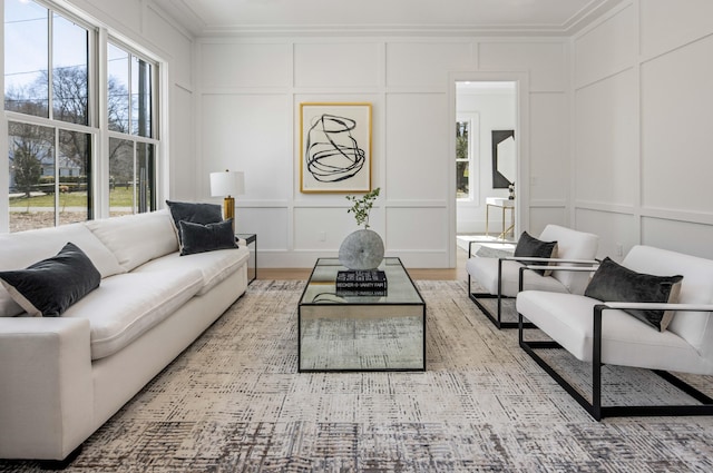 living room with ornamental molding