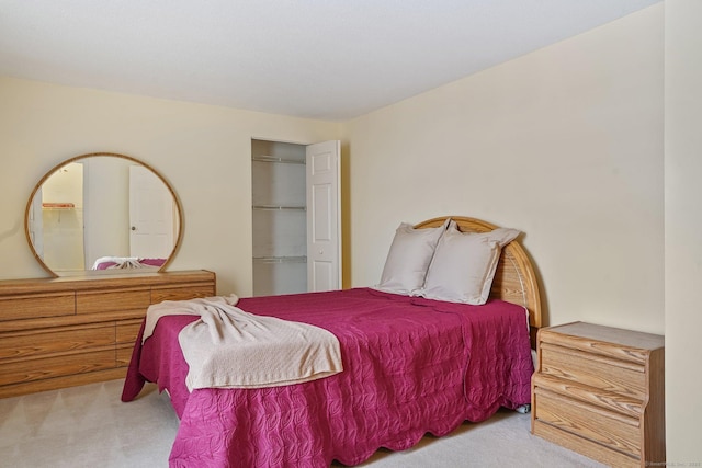 bedroom featuring carpet floors and a closet