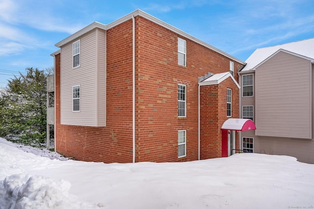 view of snow covered property