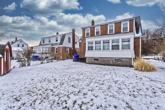 view of snow covered property