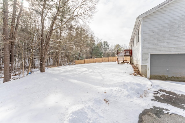 view of yard covered in snow