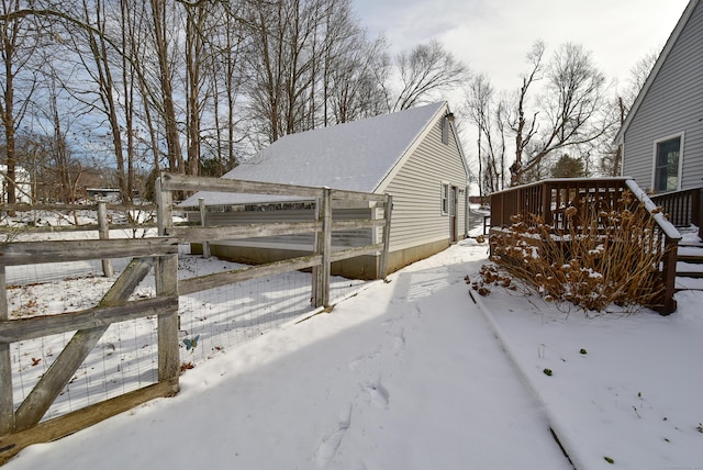 view of yard layered in snow