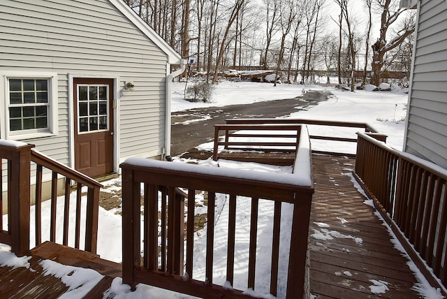 view of snow covered deck