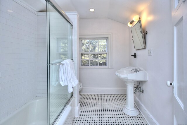 bathroom featuring shower / bath combination with glass door, recessed lighting, toilet, baseboards, and tile patterned floors