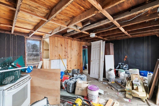 miscellaneous room featuring wooden walls