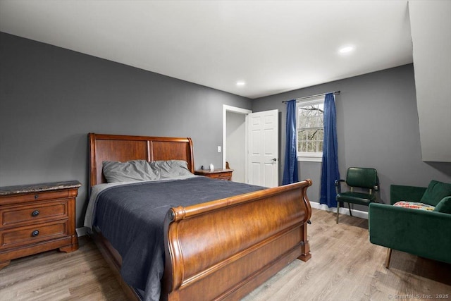 bedroom with light hardwood / wood-style floors