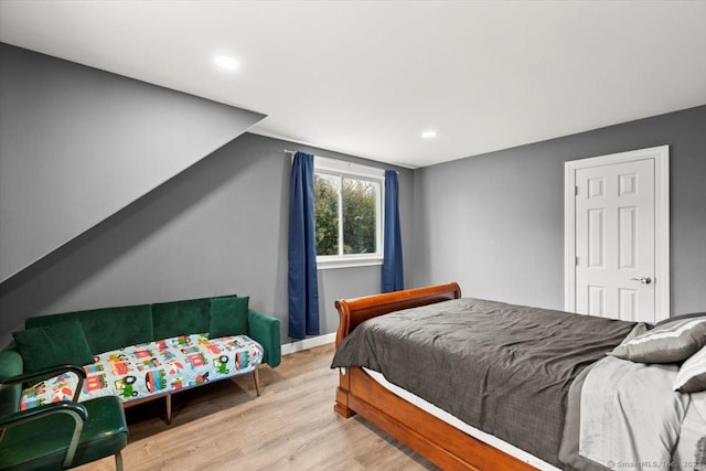 bedroom featuring light hardwood / wood-style floors