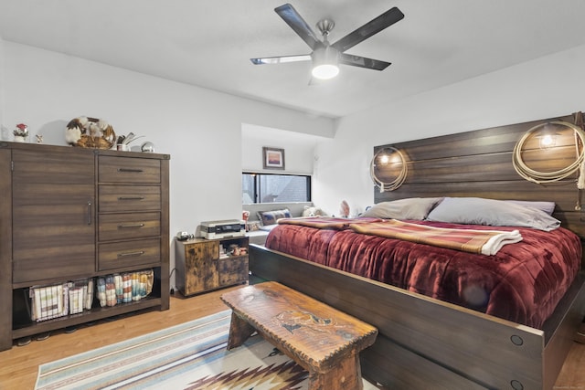 bedroom featuring ceiling fan and light wood-type flooring