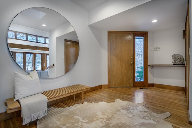 entrance foyer with light hardwood / wood-style floors