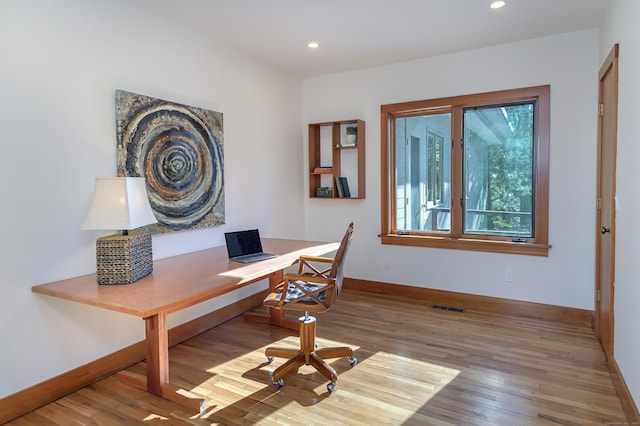 office with wood-type flooring