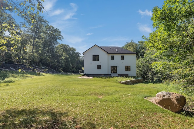 exterior space with a yard