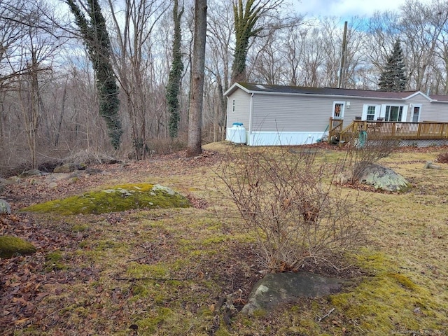 exterior space featuring a wooden deck