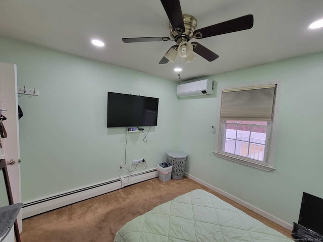 carpeted bedroom with ceiling fan, a wall unit AC, and baseboard heating