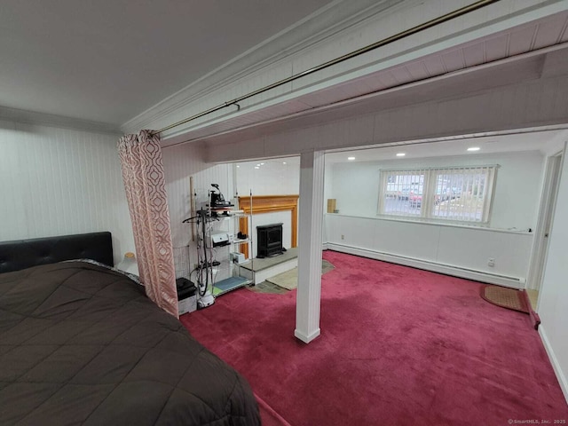 bedroom with carpet floors, a baseboard radiator, and ornamental molding