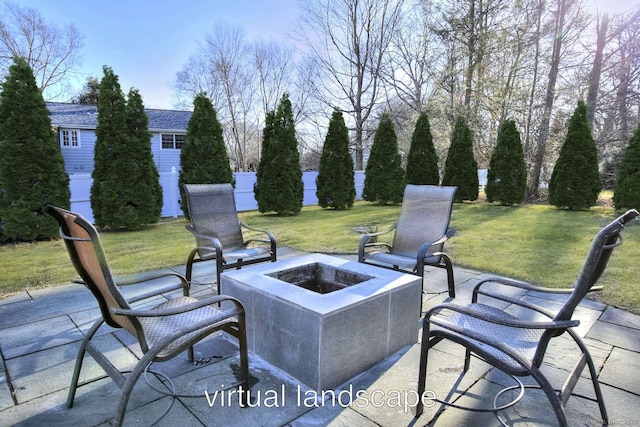 view of patio with an outbuilding and an outdoor fire pit