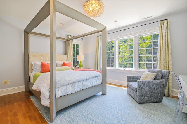 bedroom featuring hardwood / wood-style floors