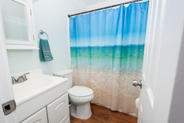 bathroom with toilet, crown molding, a shower with curtain, vanity, and hardwood / wood-style floors