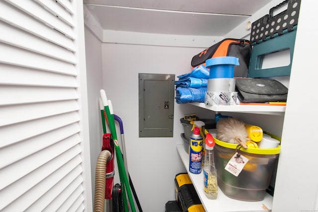 clothes washing area with electric panel