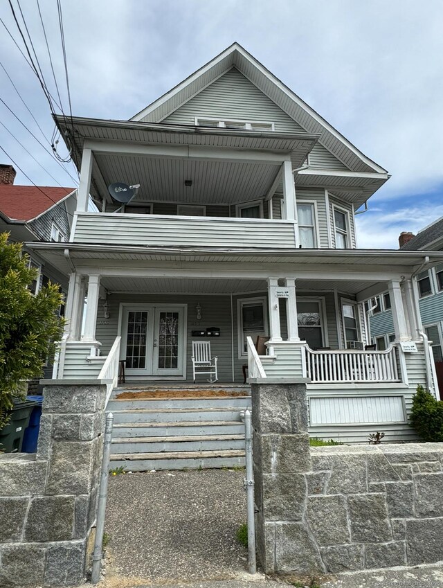 view of front of house with french doors and a porch