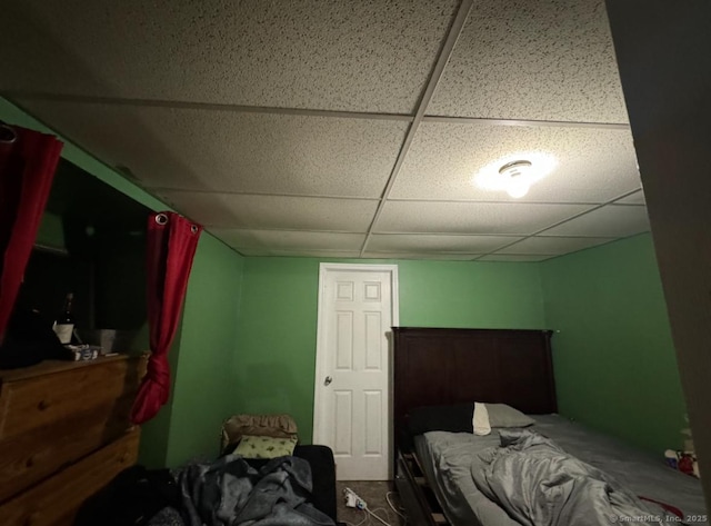 bedroom with a drop ceiling