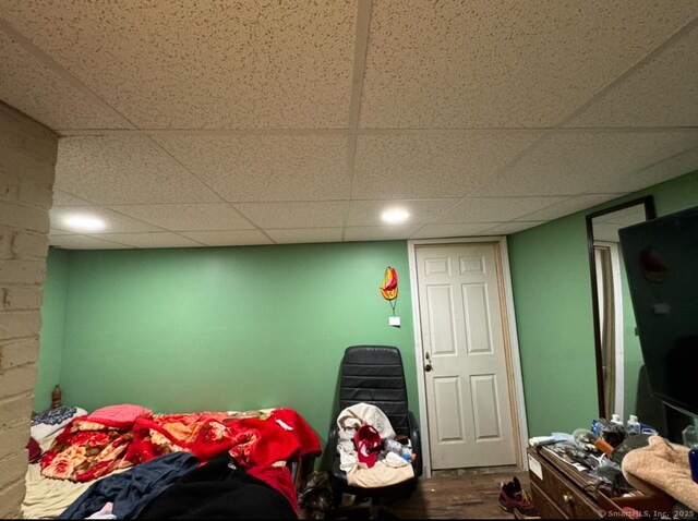 bedroom featuring hardwood / wood-style flooring