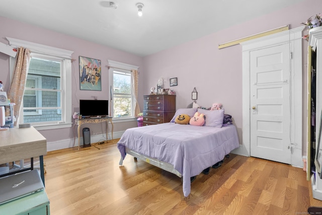 bedroom featuring light wood-type flooring