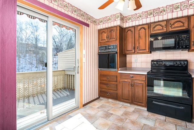 kitchen with decorative backsplash, ceiling fan, and black appliances