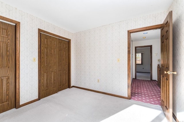 carpeted bedroom featuring a closet