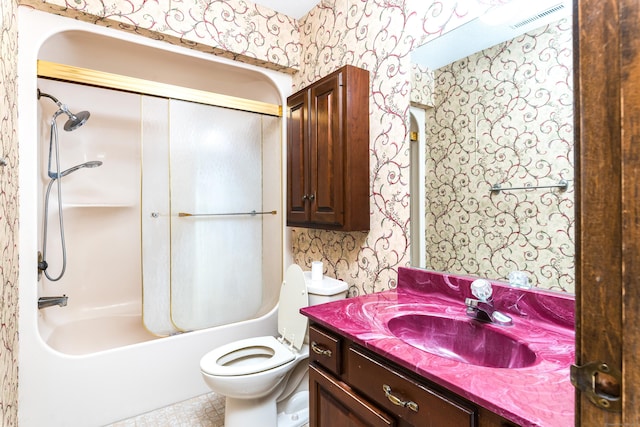 full bathroom with bathtub / shower combination, vanity, and toilet