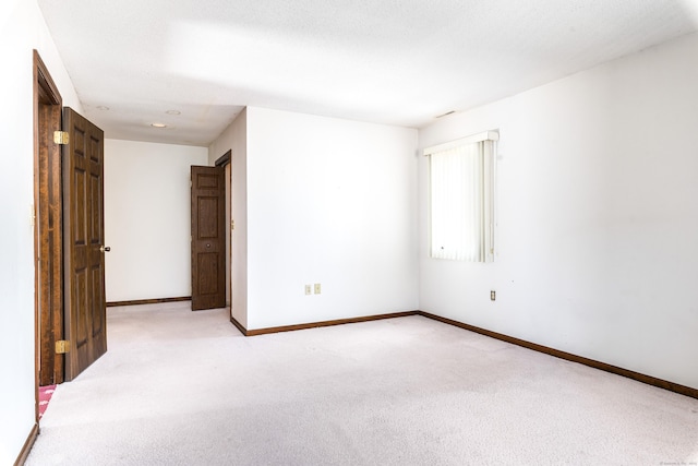 empty room with light carpet