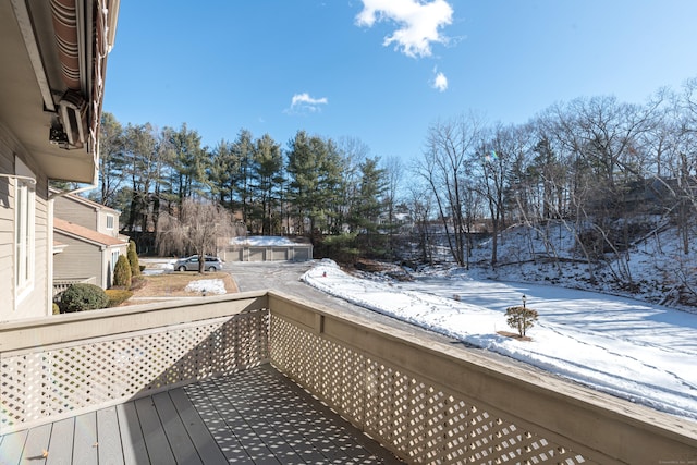 view of snow covered deck