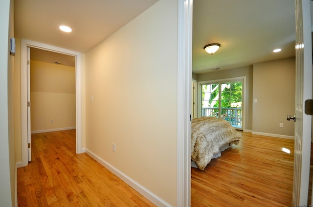 hallway featuring light wood-type flooring