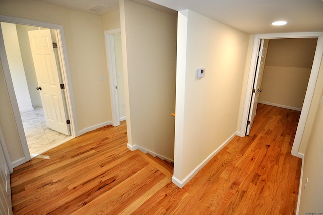 corridor featuring light wood-type flooring