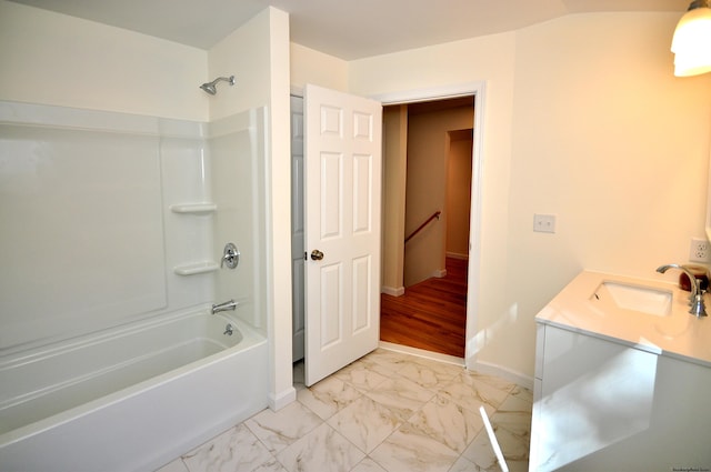 bathroom with vanity and bathing tub / shower combination