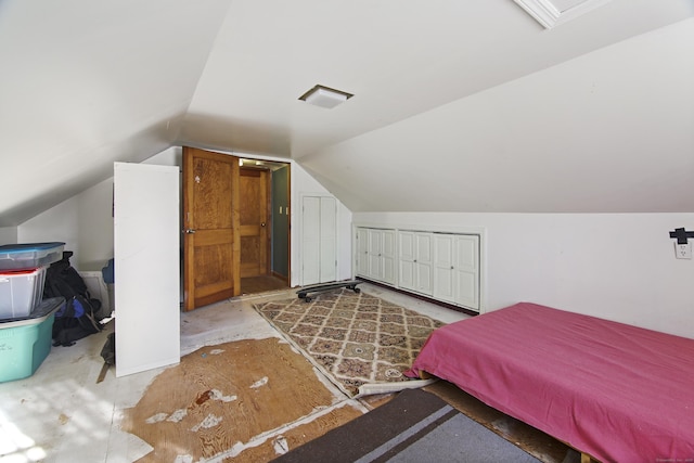 bedroom with vaulted ceiling