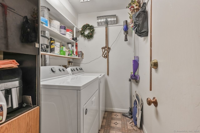 washroom with washer and clothes dryer