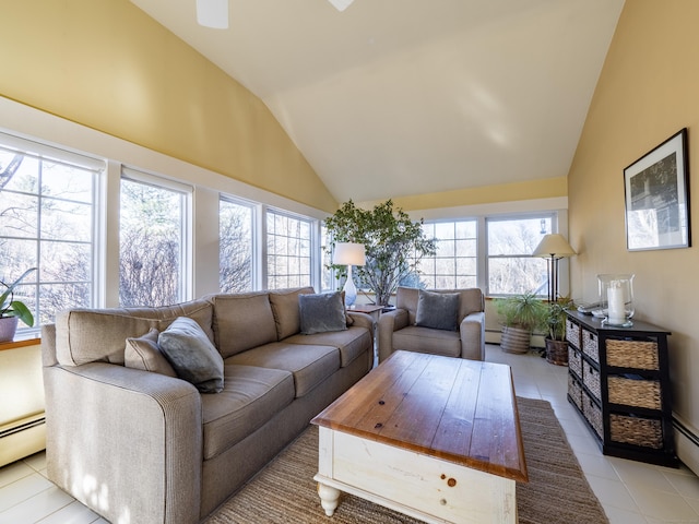 living room with baseboard heating, high vaulted ceiling, and light tile patterned floors