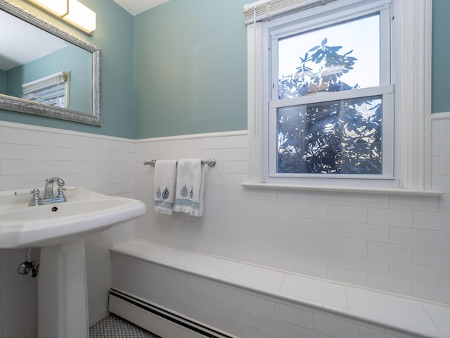 bathroom with tile walls