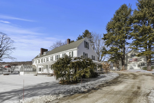 view of snow covered property