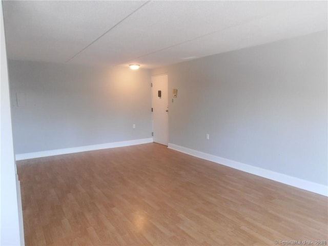 empty room featuring light hardwood / wood-style floors