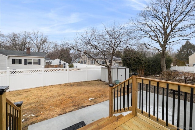 deck featuring a storage unit