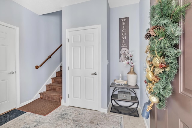 view of tiled foyer entrance